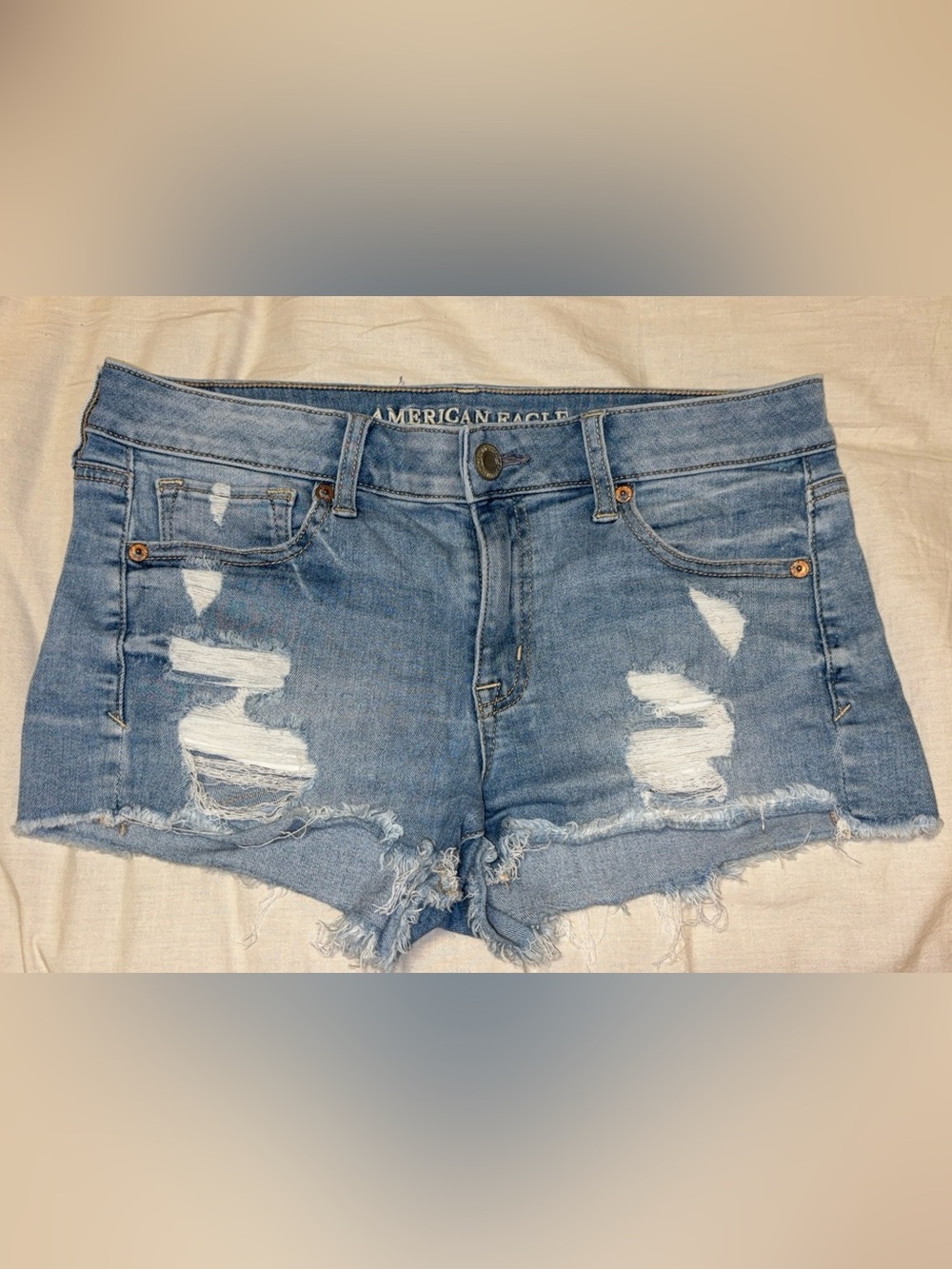 American Eagle Outfitters Shortie Light Blue Distressed Denim Shorts
